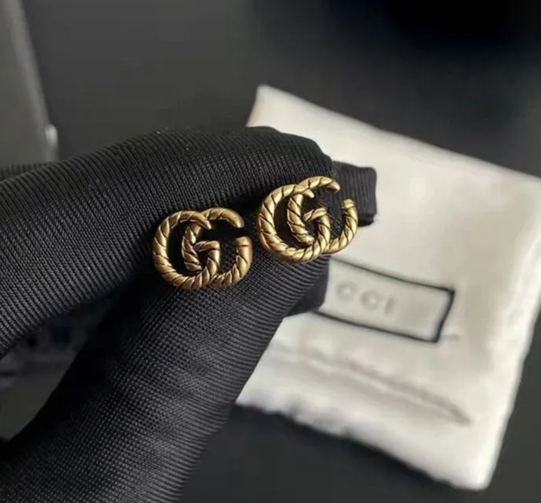 'GG' Gold effect earrings